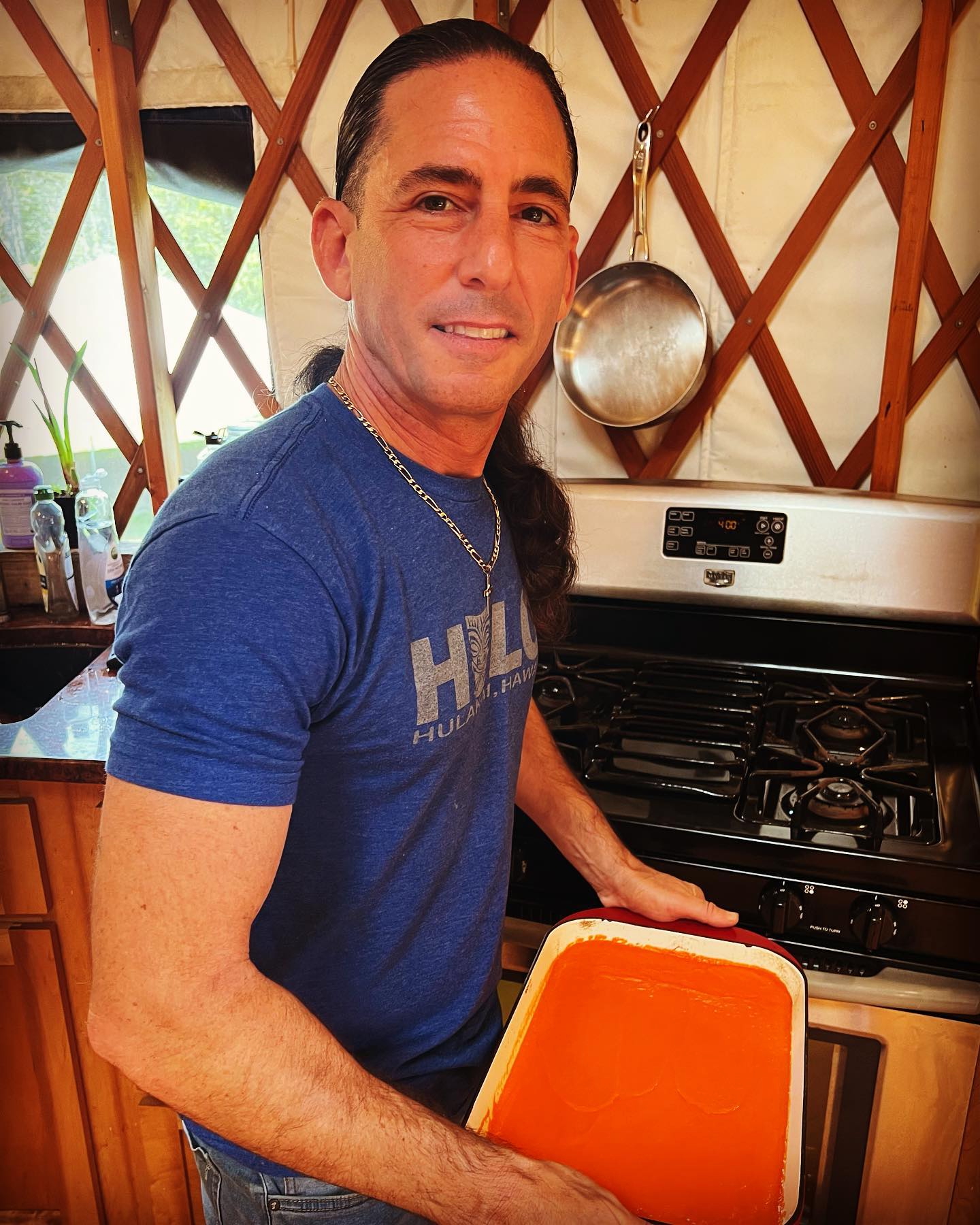 Jeff Primack preparing pepper paste in his kitchen